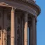 A close photo of part of a capital building